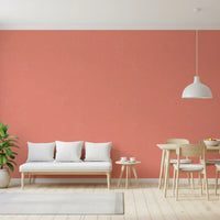 Coral linen texture wallpaper on a home office accent wall