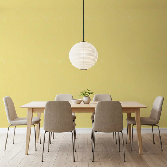 Dining room with Butter Yellow Linen wallpaper and soft textured finish