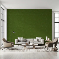 Earth-toned green wallcovering with fine grain and vintage-modern influence
