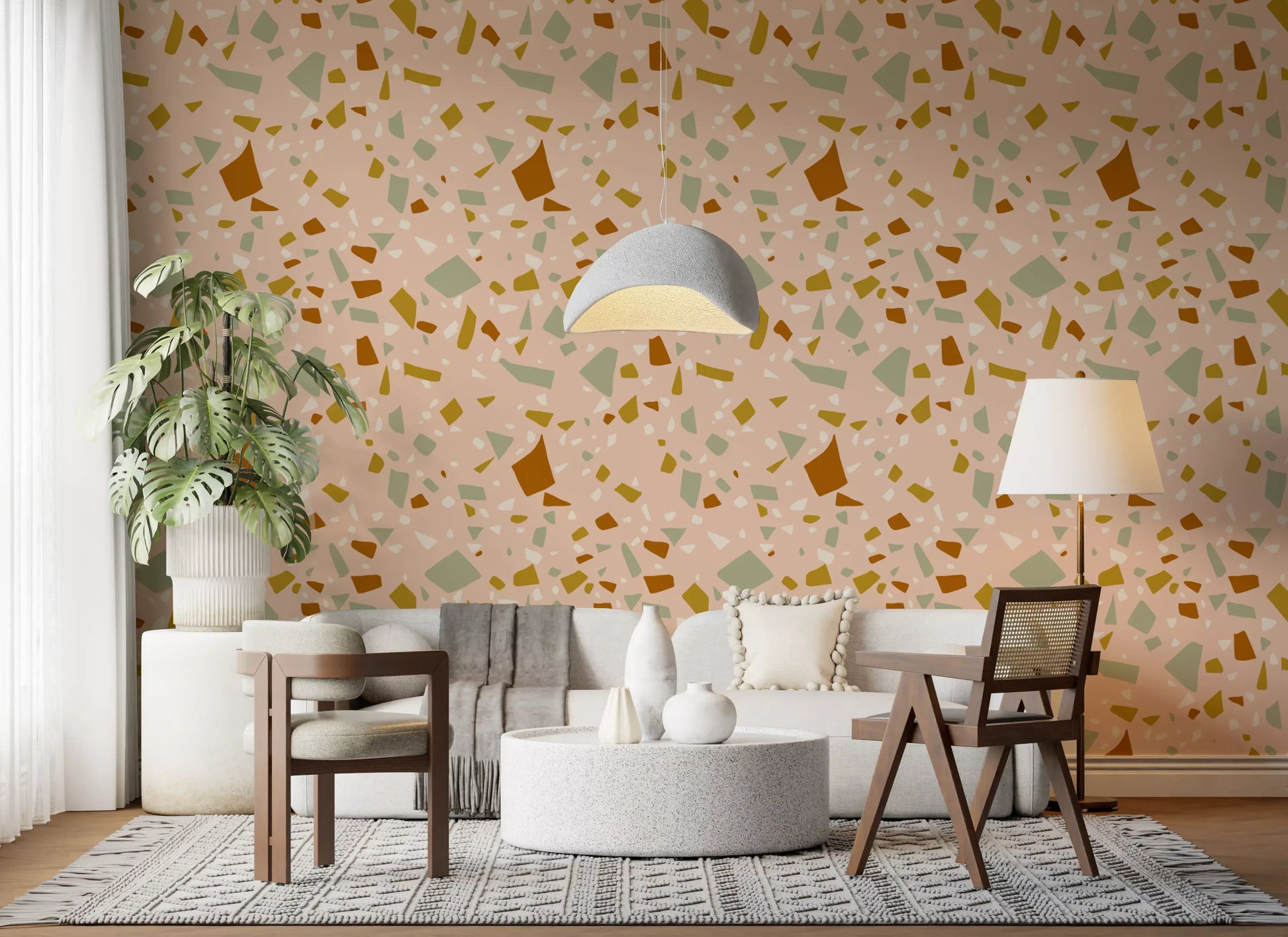 Modern terrazzo wallpaper with irregular shapes and muted earthy tones
