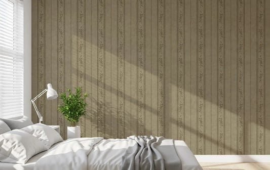Bedroom with taupe grey ticking stripe wallpaper and floral linen detail