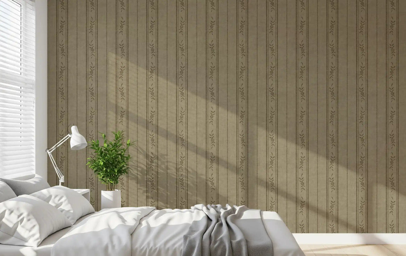 Bedroom with taupe grey ticking stripe wallpaper and floral linen detail