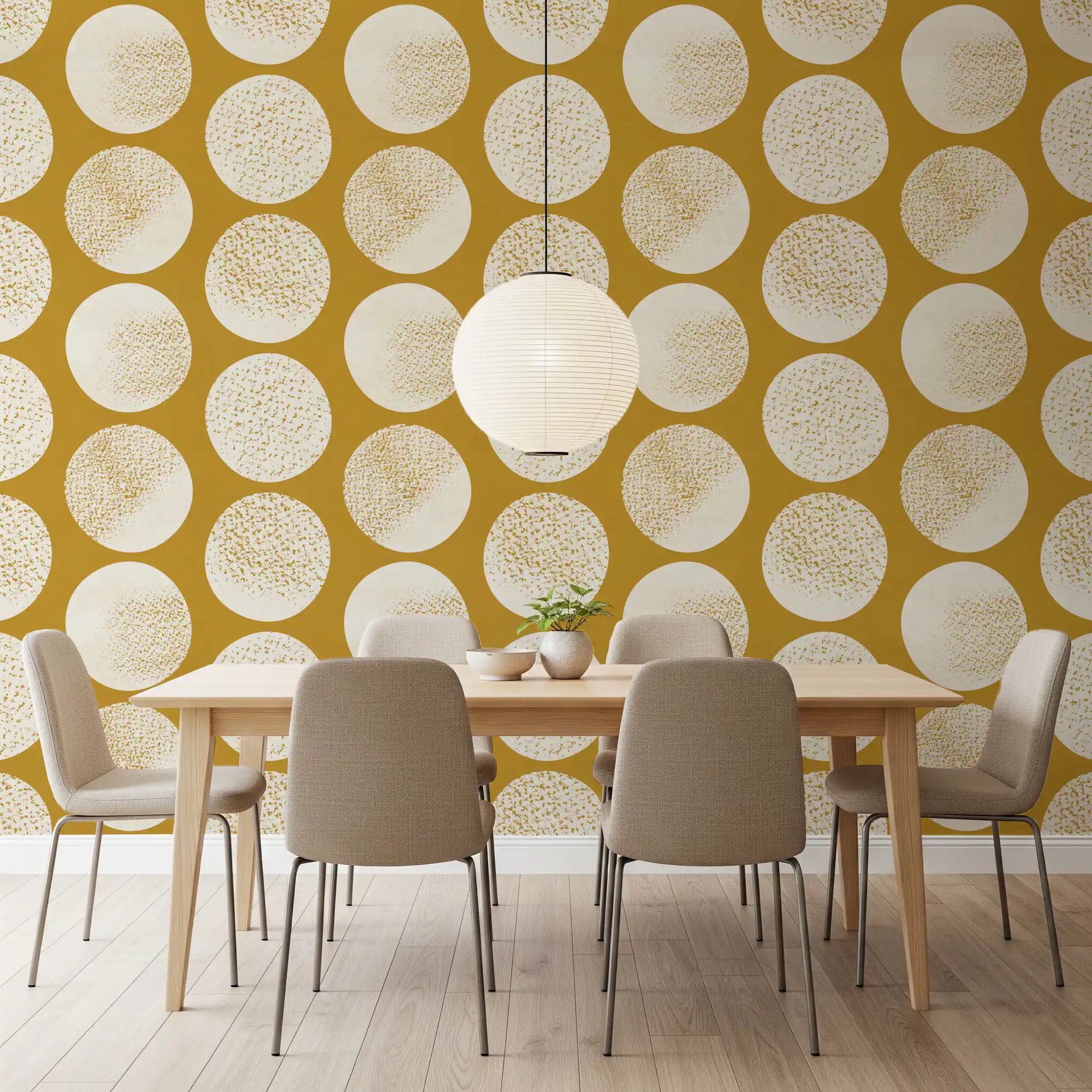 Dining room with cream mustard wallpaper and oversized stippled circles