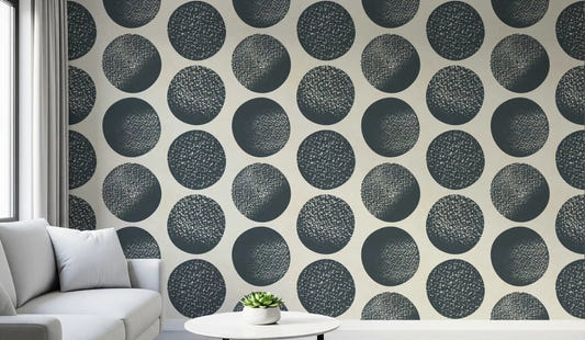 Office wall with cream dot wallpaper and dark blue textured motifs