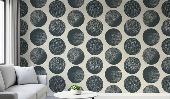 Office wall with cream dot wallpaper and dark blue textured motifs