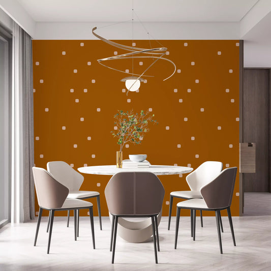 Dining room wall showing terracotta beige wallpaper with soft polka dot spacing