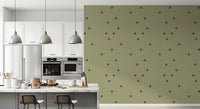 Retro dot wallpaper with muted sage tones and an airy patterned finish