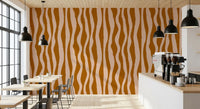 Cafe area wall showing Terracotta Stripe Wallpaper with soft pink wave bands