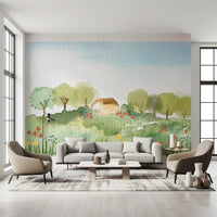 Living room Watercolor Wall Mural with cottage view and gentle field detail