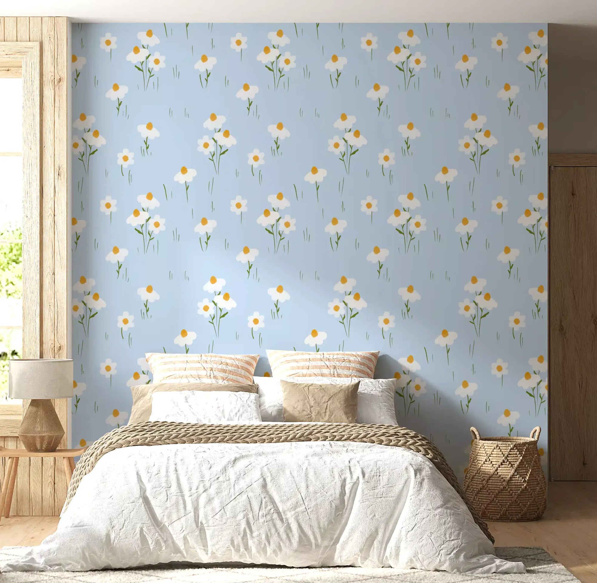 Bedroom with Daisy Dreams on Blue wallpaper behind a neutral toned bed