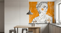 Brushstroke texture across the orange field of this Tangerine Muse wall mural