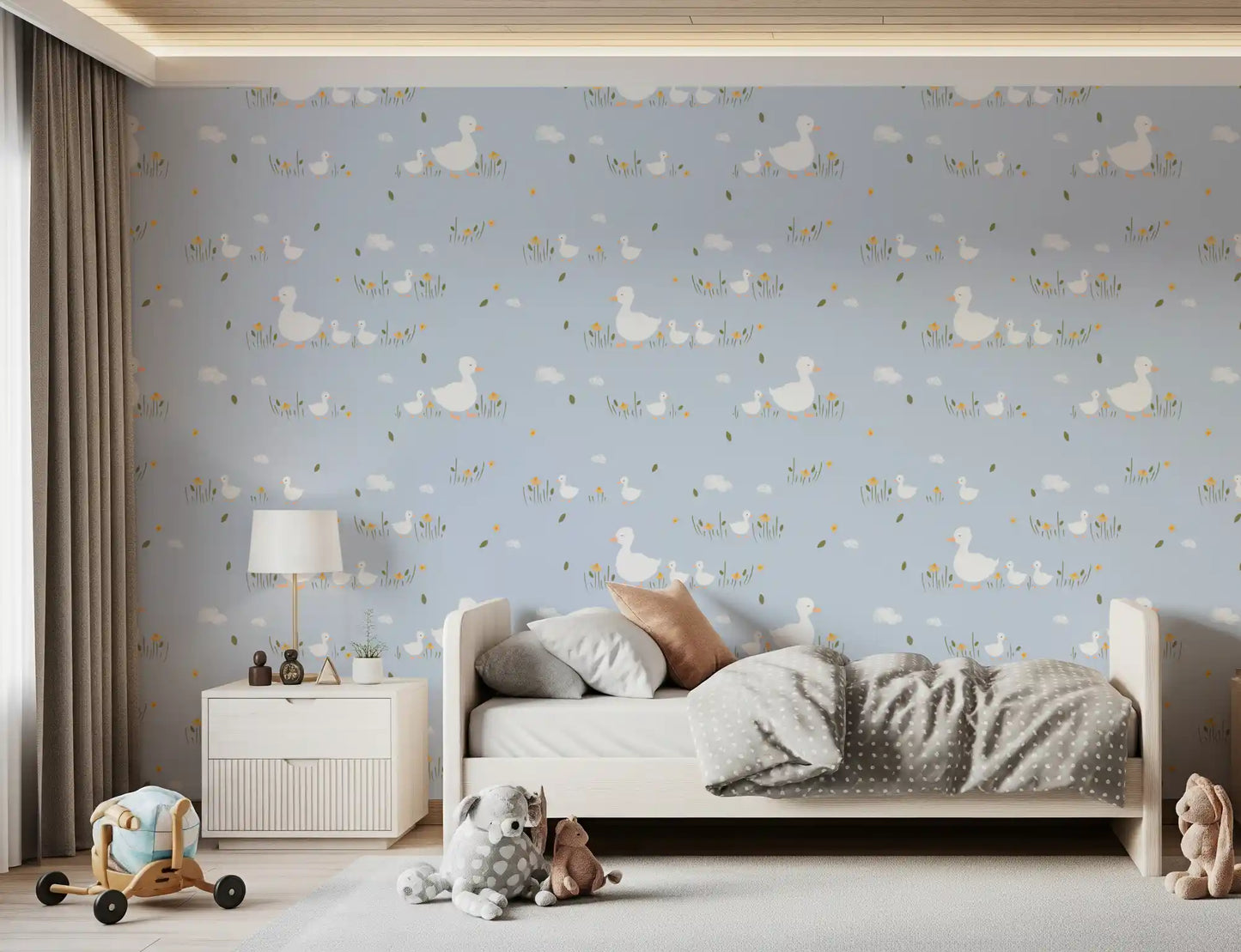 Mustard daisies and olive grass strokes punctuate the Baby Ducklings wallpaper