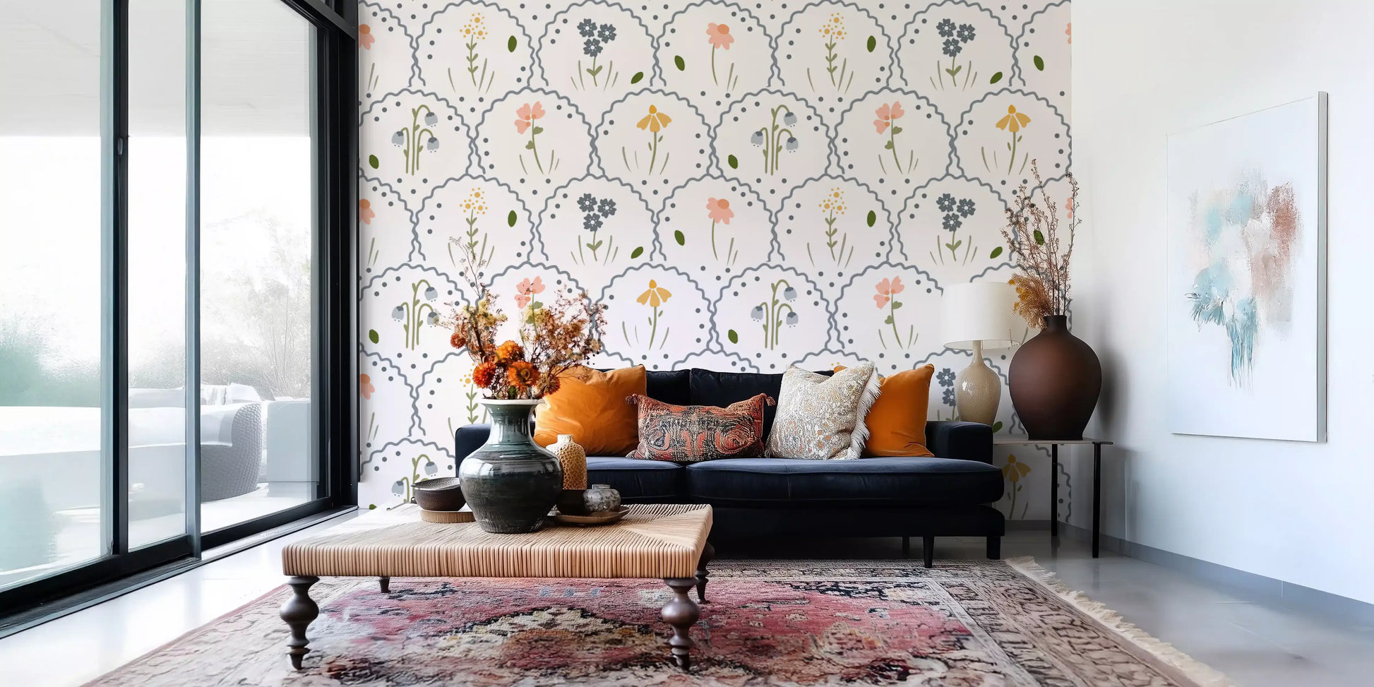 Bright lounge area styled with Wildflowers wallpaper on the back section