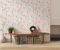 Coral roses and peach daisies dot the English Garden wallpaper repeat
