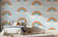 Rainbow & Starry Skies wallpaper behind a kids' bedroom setup