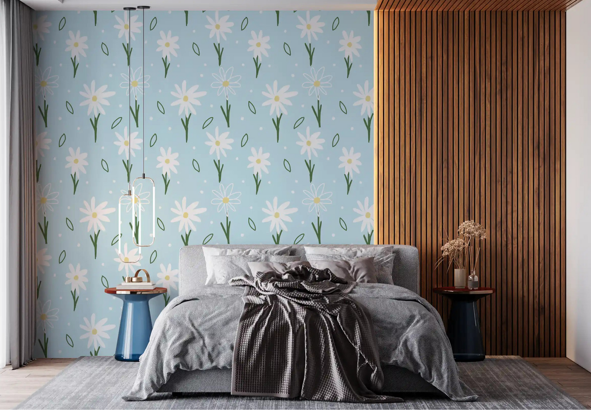 Pale blue tones of Daisy Delight Wallpaper sit easy in a quiet bedroom setup.
