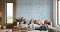 Cosy lounge backed by Bubbles wallpaper in pale blue