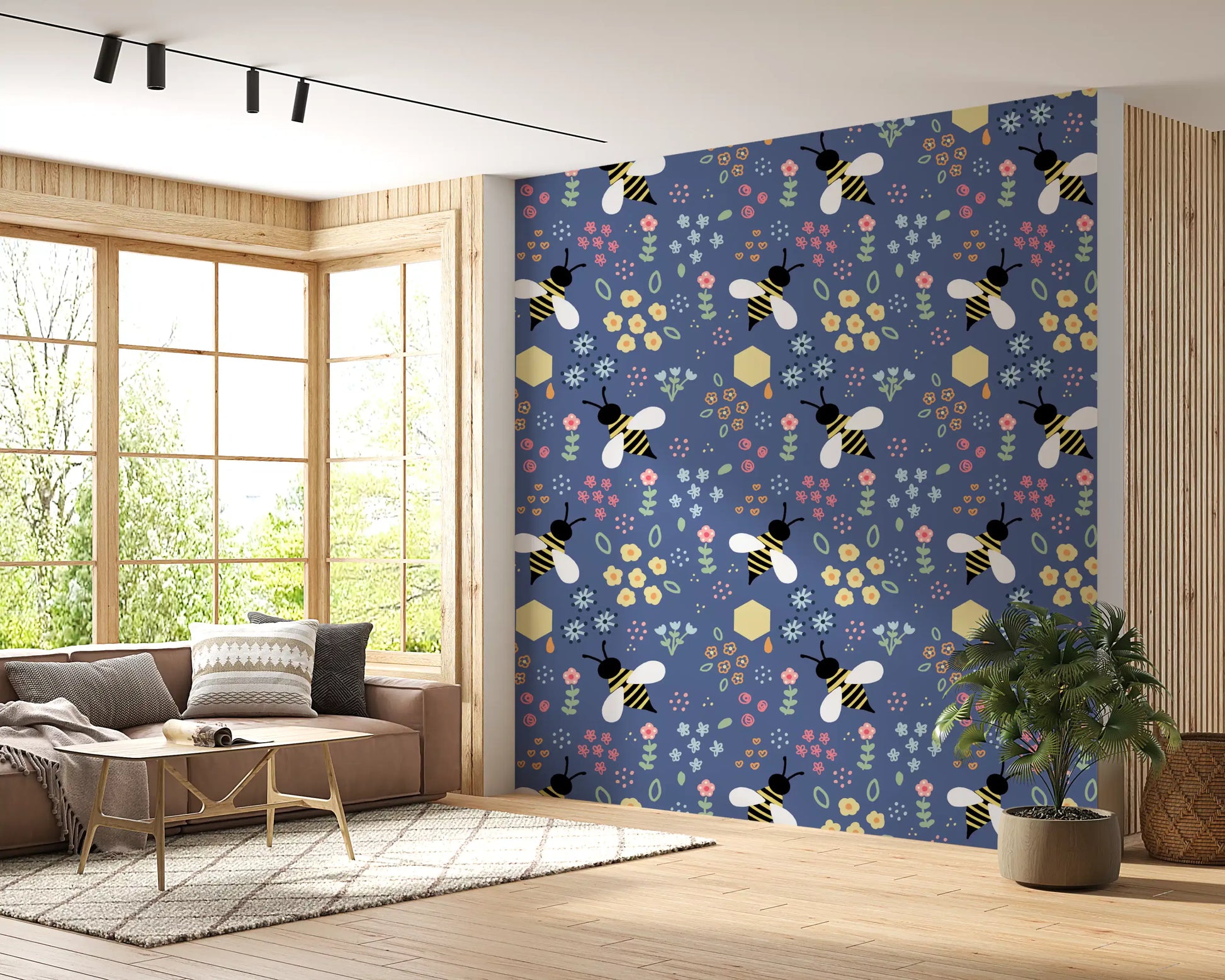 Lounge area paired with deep blue bee and bloom wallpaper