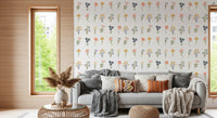 Living room with the Wildflower Portraits wallpaper in mustard and pink 