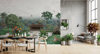 Tall palms lean across a flowing river in Emerald Palace wall mural with gardens around.