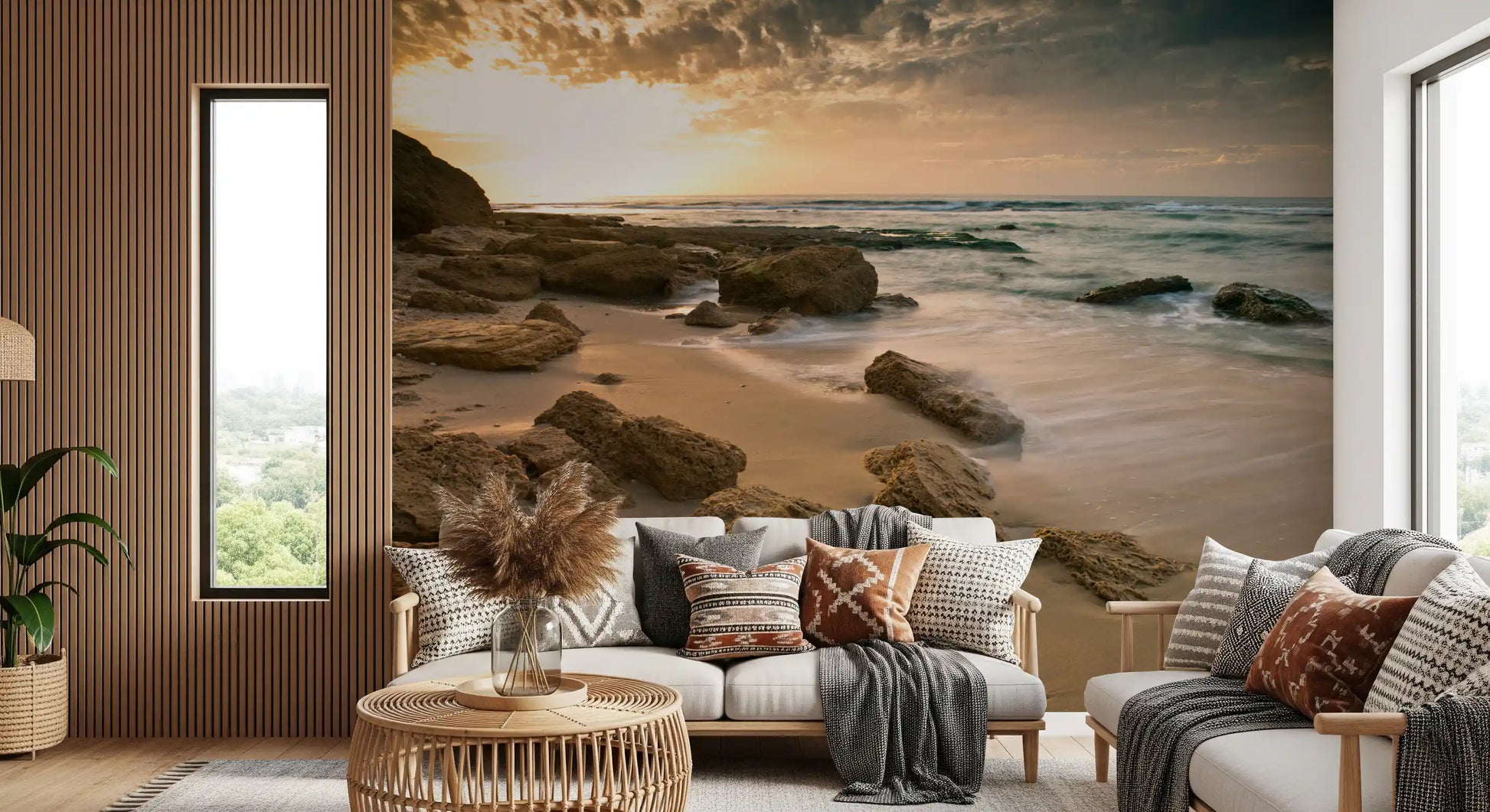 Relaxed lounge backed by warm sunrise colours of the Golden Quiet Shore mural