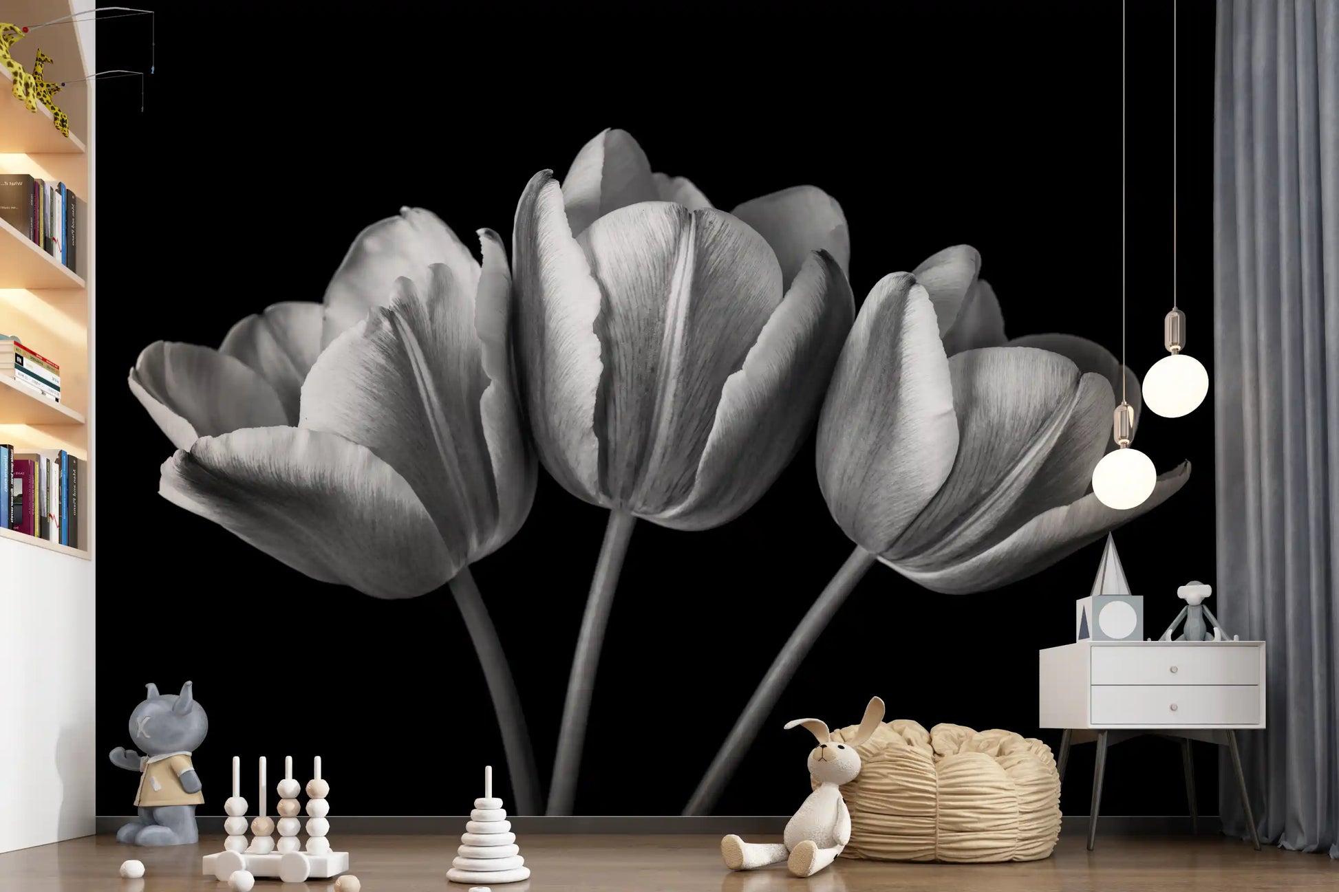 Nursery Play area  where pale tulip blooms spread a black wall mural