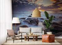 Misty waves curl past stones in the Coastal Splendor wall mural