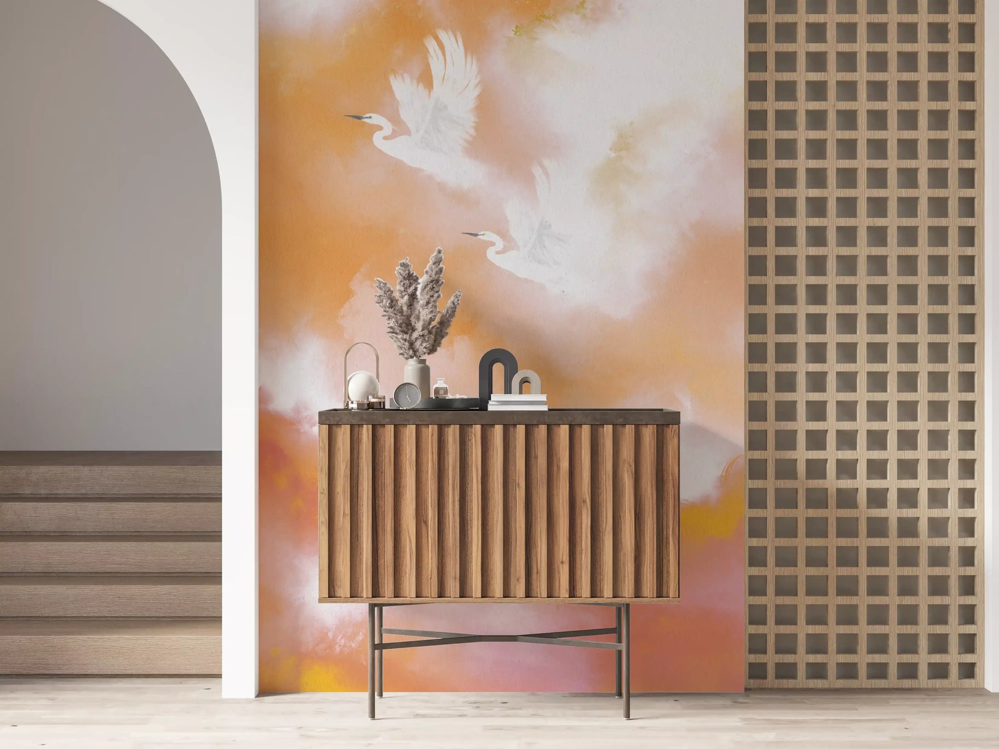 Two white herons climbing through a peach dawn sky wall mural