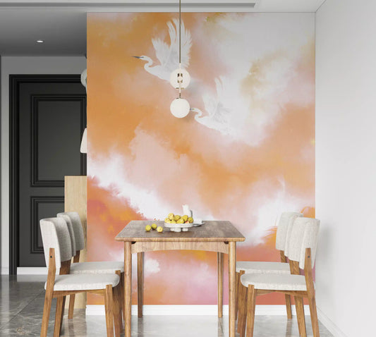 Dining room with two herons flying over a peach watercolour wall mural