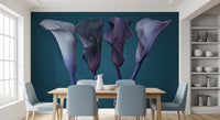Dining room seating set against a moody calla bloom wall mural