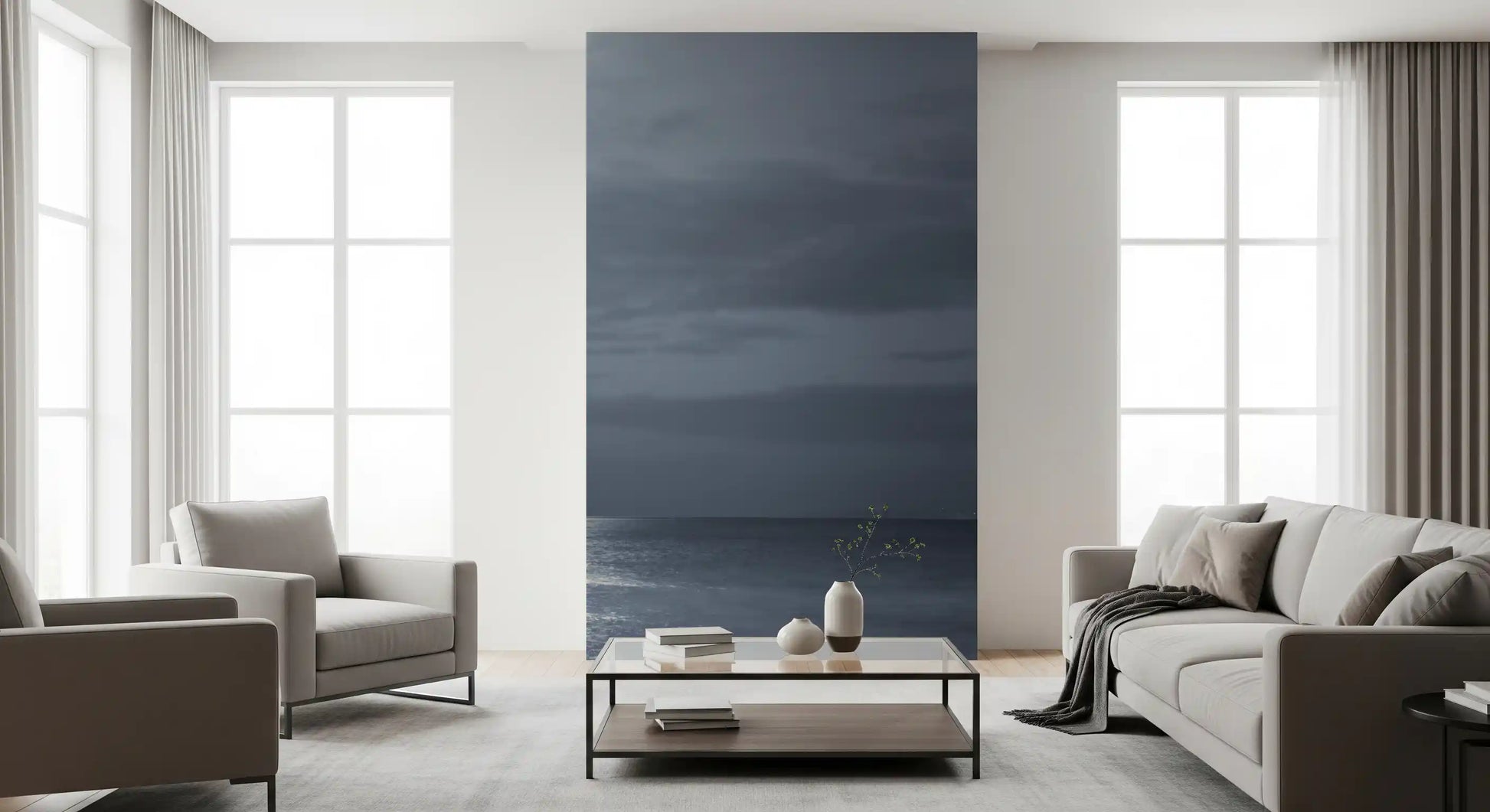 Cool grey-blue sky meets the sea in this Moonlit Ocean wall mural