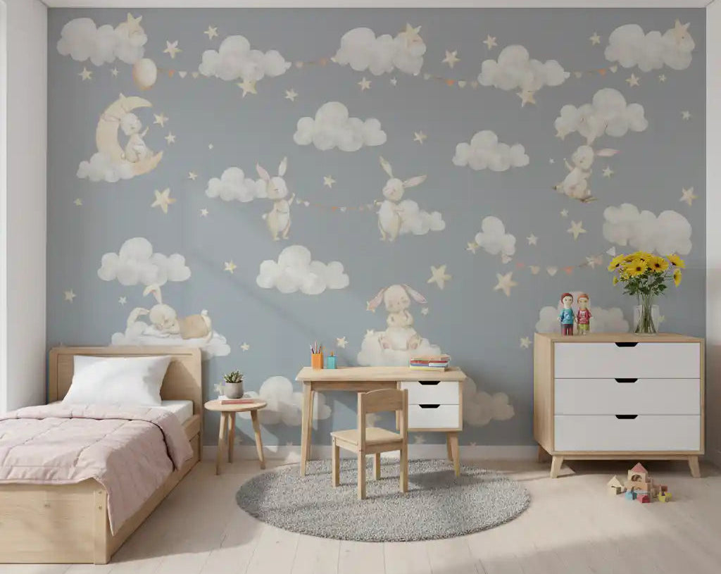 Pastel bunnies and clouds wall mural styled in a calm kids' room