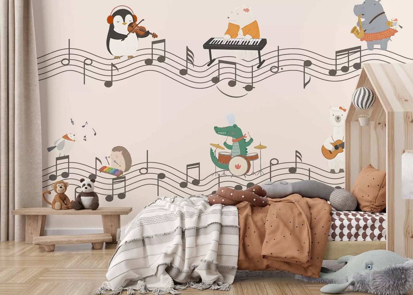 Cosy kids' room with the Harmonious Animal Band wall mural behind a tented bed setup