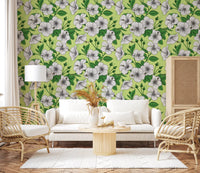 Base meets hibiscus heads in the Living room on this Aloha wallpaper