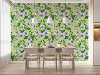 Pen-drawn cover a dining room scene with this tropical Hawaiian wallpaper.