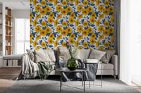Large hibiscus heads pair with pale line drawings on the wallpaper
