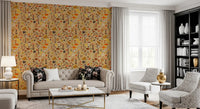 Chanterelle and boletus mushrooms scattered over ochre on this wallpaper