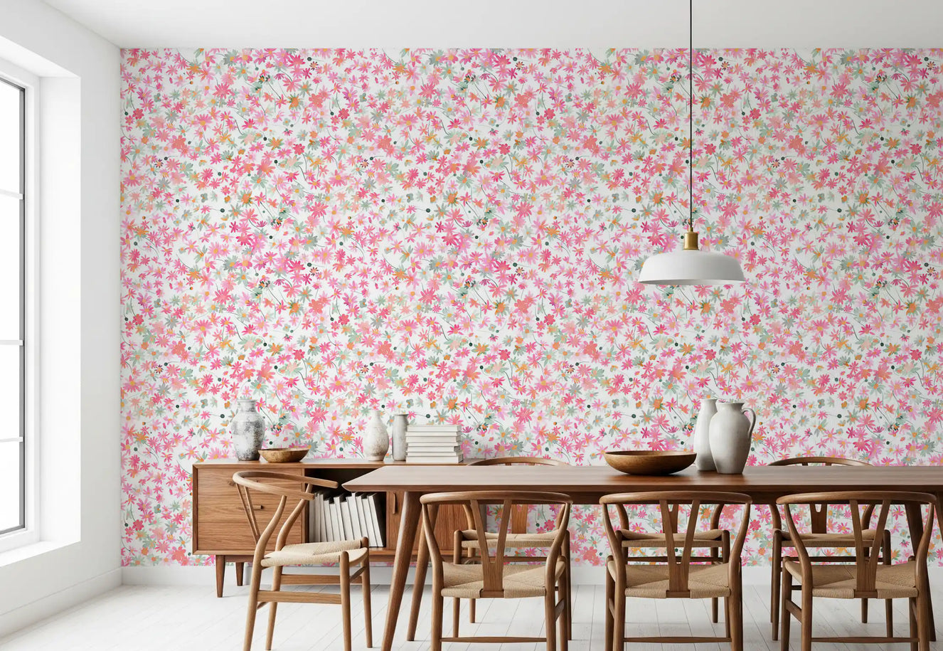 Pink, coral and peach florals cover the dining room in Daisy Dance wallpaper