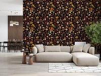 Tiny fly agarics and golden scatter through the Wild wallpaper.