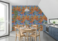 Kitchen-dining area paired with orange and blue magnolia florals on the wallpaper