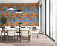 magnolia blooms in orange, blue and teal across the Layered Floral Canvas wallpaper