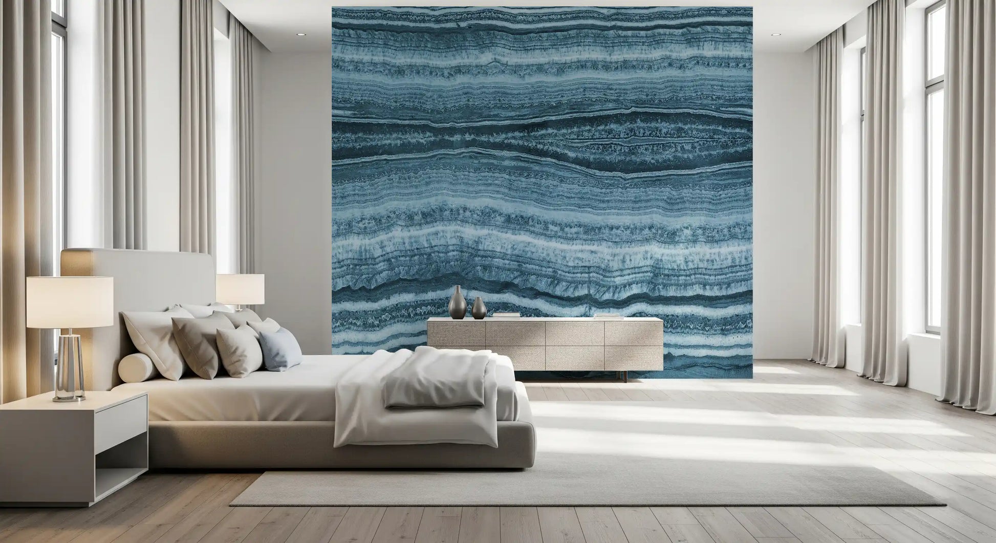 Bedroom finished in a blue marble wall mural with horizontal mineral veining