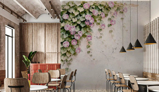 Cafe seating sits below trailing pink morning glory in this rustic wall mural