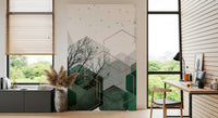 Layered green tones meeting grey sky in the Emerald Hexagon Vista wall mural