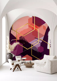 Living room area backed by the Bold Geometric Flow wall mural in plum tones