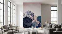 Dusky pink and deeper rose meet navy tree shapes in the Geometric Grove wall mural.