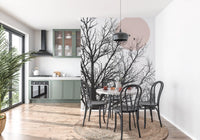 Pale pink moon glows behind leafless limbs in a Conversation at Dawn wall mural