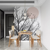 Dining room detailed with branch silhouettes on a pale pink moon wall mural