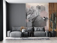 Soft pink hexagons spread behind the sofa as a living room wall mural