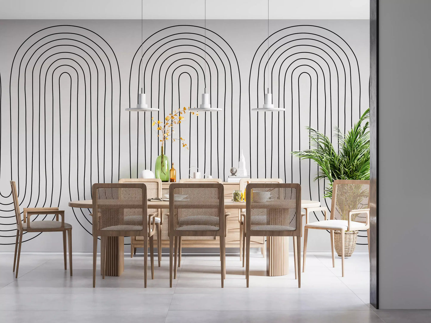Dining room area set against a fine arch-line wall mural in chalky off-white